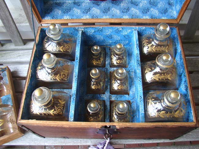 An important late 18th century iron bound oak travelling liquor chest belonging to Gen. Abraham Rose of Long Island having its original and complete set of gilded hand blown glass decanters(12), tumblers, funnel and wine glasses. Spanish circa 1790.  — image 5